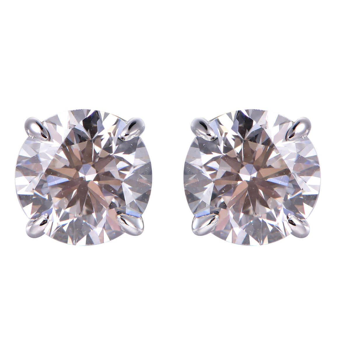 A pair of round brilliant-cut diamond stud earrings in a four-prong setting, shown on a plain white background.