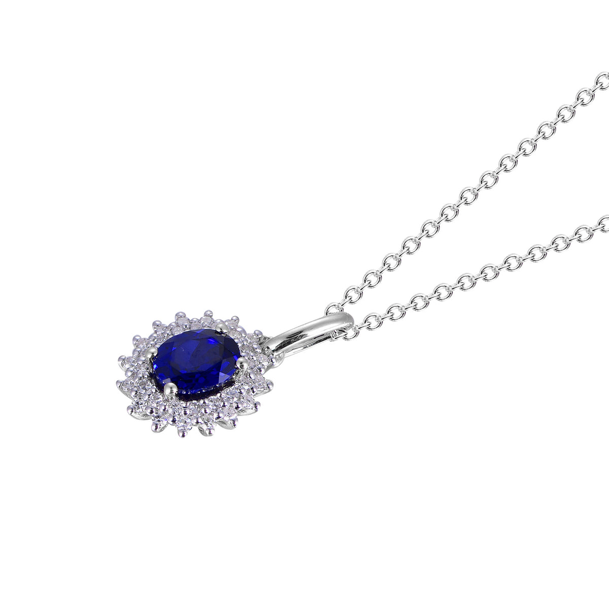 14K white gold pendant featuring an oval blue sapphire surrounded by a halo of diamonds.