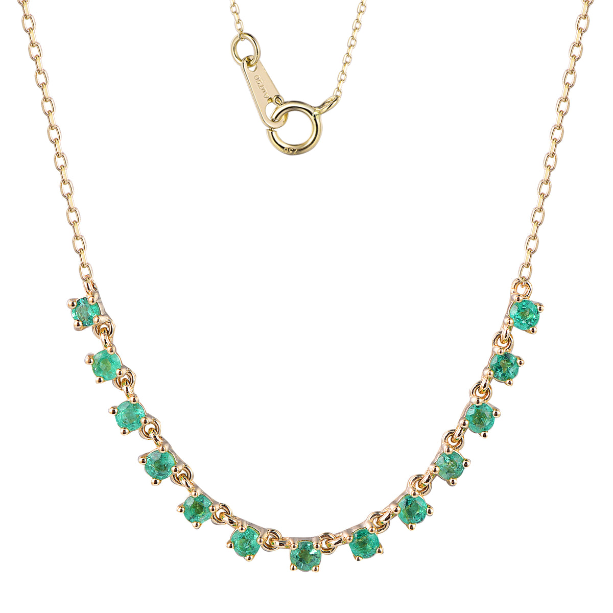 A gold chain necklace featuring a curved row of small round-cut green emerald stones, shown on a plain white background with the clasp and chain visible at the top.